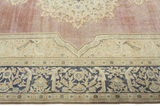 Corner detail of 1950s Vintage rug showing border pattern and Wool pile
