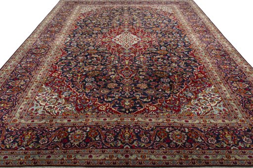 Surface texture of 2000s Kashan rug with natural Wool and intricate pattern