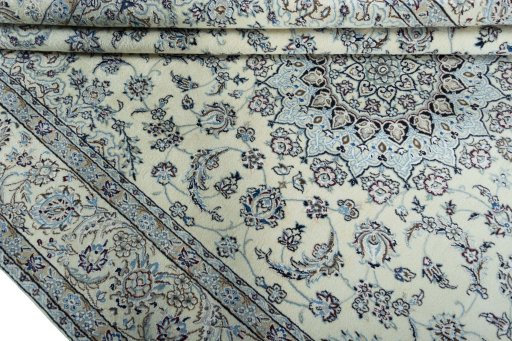 Close-up detail of 2000s Nain rug from Iran / Persia showing Wool weave
