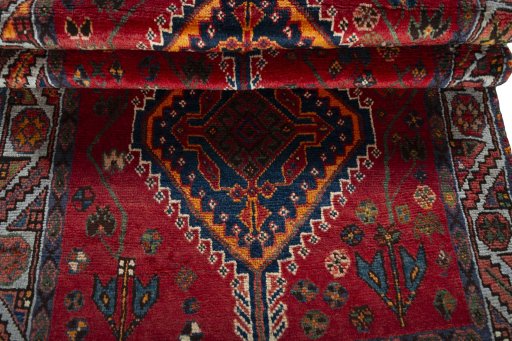 Full view of 2000s Shiraz rug from Iran / Persia, 193 × 111 cm in Red tones