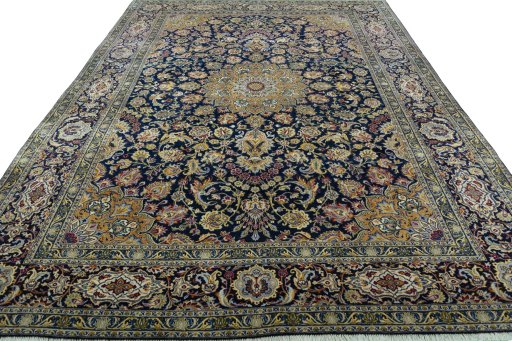 Surface texture of 2000s Kashan rug with natural Wool and intricate pattern