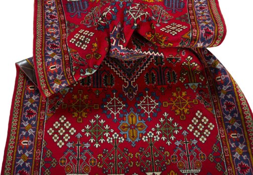 Close-up detail of 2000s Meymeh rug from Iran / Persia showing Wool weave