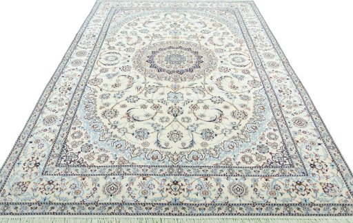 Surface texture of 2000s Nain rug with natural Wool and intricate pattern