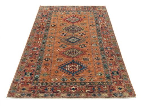 Surface texture of New Kazak rug with natural Wool and intricate pattern