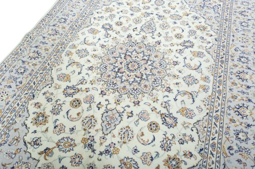 Backside of handmade New Kashan rug showing knot structure and weave density