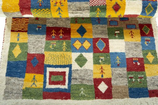 Full view of 2000s Persian Gabbeh rug from Pakistan, 146 × 98 cm in Multi Color tones