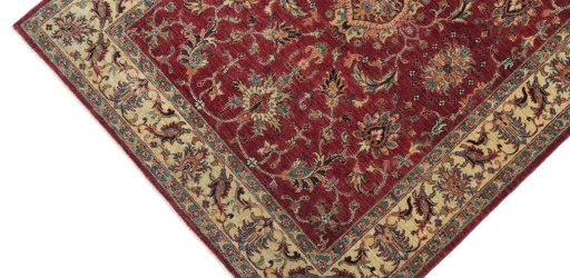 Backside of handmade New Farahan rug showing knot structure and weave density