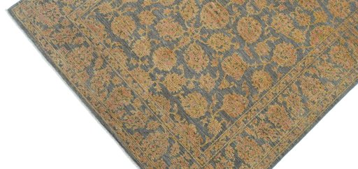 Backside of handmade New Farahan rug showing knot structure and weave density