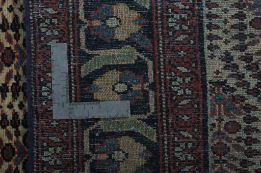 Close-up detail of 1930s Hamedan rug from Iran / Persia showing Wool weave