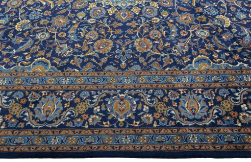 Corner detail of 2000s Kashmar rug showing border pattern and Wool pile