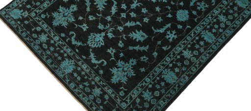Backside of handmade New Farahan rug showing knot structure and weave density