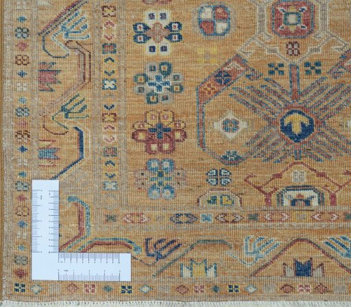 Corner detail of New Kazak rug showing border pattern and Wool pile