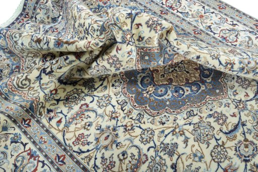 Surface texture of 2000s Nain rug with natural Wool and intricate pattern