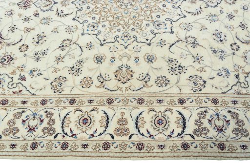 Corner detail of 2000s Nain rug showing border pattern and Wool pile