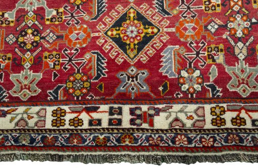 Central medallion detail of 2000s Shiraz rug from Iran / Persia