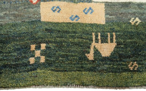 Central medallion detail of 2000s Persian Gabbeh rug from Iran / Persia