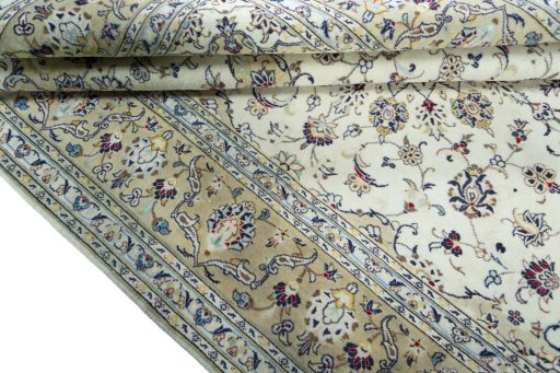 Close-up detail of 2000s Kashan rug from Iran / Persia showing Wool weave