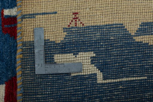 Close-up detail of 2000s Persian Gabbeh rug from Pakistan showing Wool weave