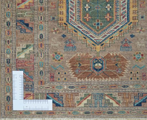 Corner detail of New Kazak rug showing border pattern and Wool pile