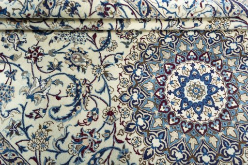 Close-up detail of 2000s Nain rug from Iran / Persia showing Wool weave
