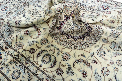 Surface texture of New Nain rug with natural Wool and intricate pattern