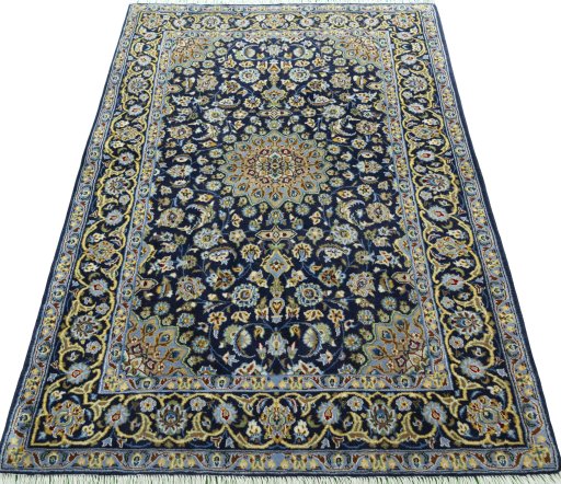 Surface texture of 2000s Kashan rug with natural Wool and intricate pattern