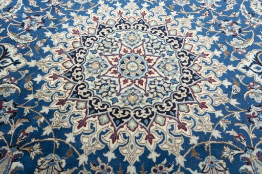 Central medallion detail of 2000s Nain rug from Iran / Persia
