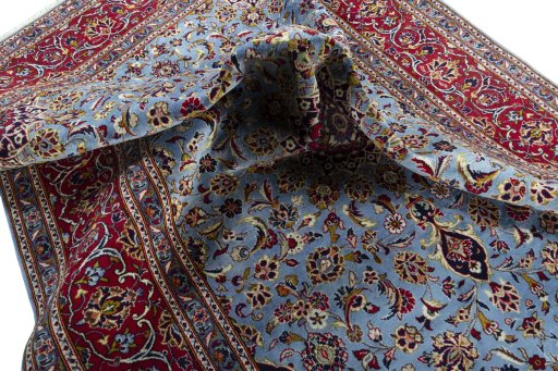 Surface texture of 2000s Kashan rug with natural Wool and intricate pattern