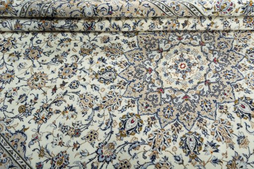 Close-up detail of 2000s Kashan rug from Iran / Persia showing Wool weave