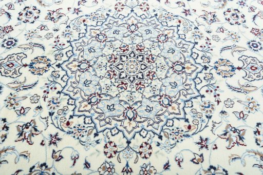 Central medallion detail of New Nain rug from Iran / Persia