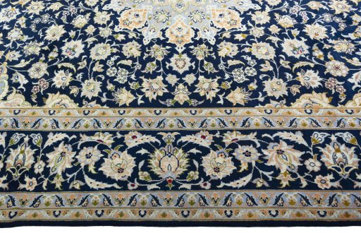Corner detail of 2000s Najafabad rug showing border pattern and Wool pile
