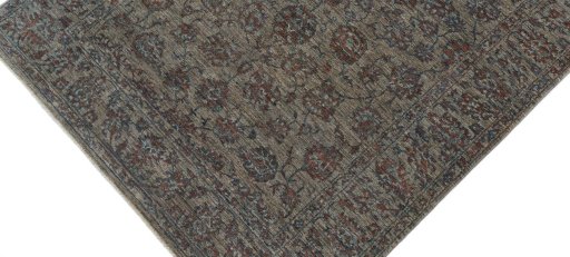 Backside of handmade New Farahan rug showing knot structure and weave density