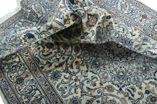 Surface texture of 2000s Kashmar rug with natural Wool and intricate pattern