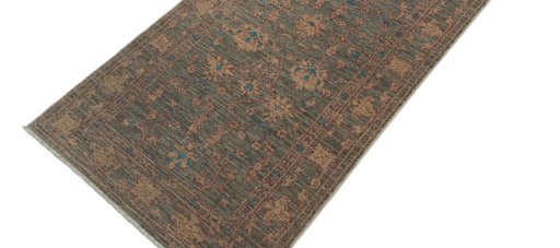 Backside of handmade New Farahan rug showing knot structure and weave density
