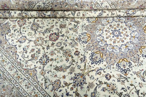 Close-up detail of 2000s Kashan rug from Iran / Persia showing Wool weave
