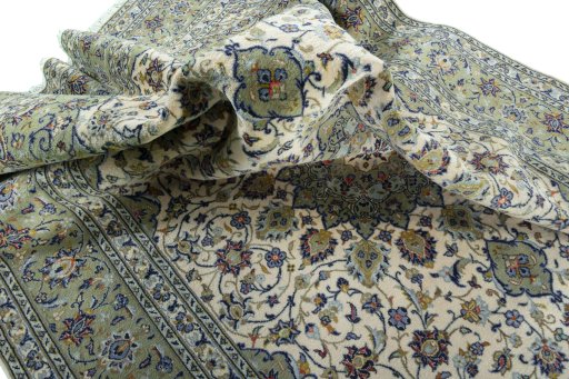 Surface texture of 2000s Kashan rug with natural Wool and intricate pattern