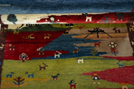 Full view of 2000s Persian Gabbeh rug from Pakistan, 186 × 111 cm in Multi Color tones