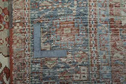 Surface texture of 1930s Heriz rug with natural Wool and intricate pattern