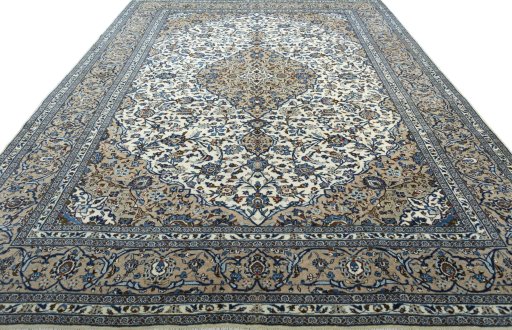 Surface texture of 2000s Kashan rug with natural Wool and intricate pattern