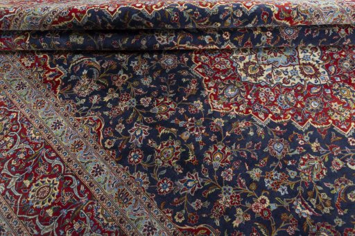 Close-up detail of New Kashan rug from Iran / Persia showing Cork weave