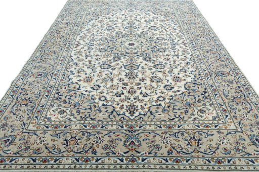 Surface texture of 2000s Kashan rug with natural Wool and intricate pattern
