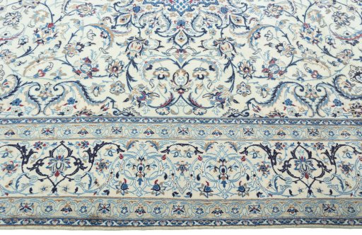 Corner detail of 2000s Nain rug showing border pattern and Wool pile