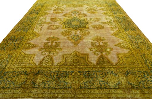 Surface texture of 1950s Vintage rug with natural Wool and intricate pattern