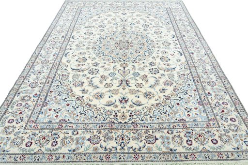 Surface texture of 2000s Nain rug with natural Wool and intricate pattern