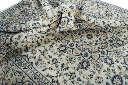 Surface texture of 2000s Kashan rug with natural Wool and intricate pattern