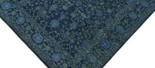 Backside of handmade New Farahan rug showing knot structure and weave density