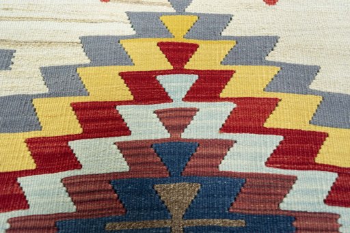Backside of handmade New Modern Design rug showing knot structure and weave density