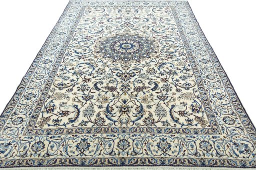 Surface texture of 2000s Nain rug with natural Wool and intricate pattern