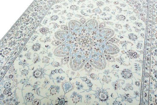 Backside of handmade 2000s Nain rug showing knot structure and weave density