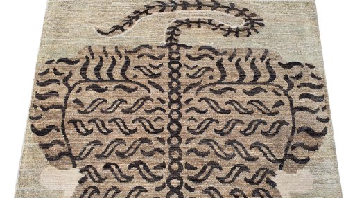 Backside of handmade New Farahan rug showing knot structure and weave density